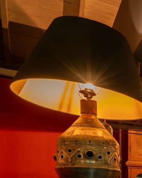 Antique brass urn-shaped lamp base