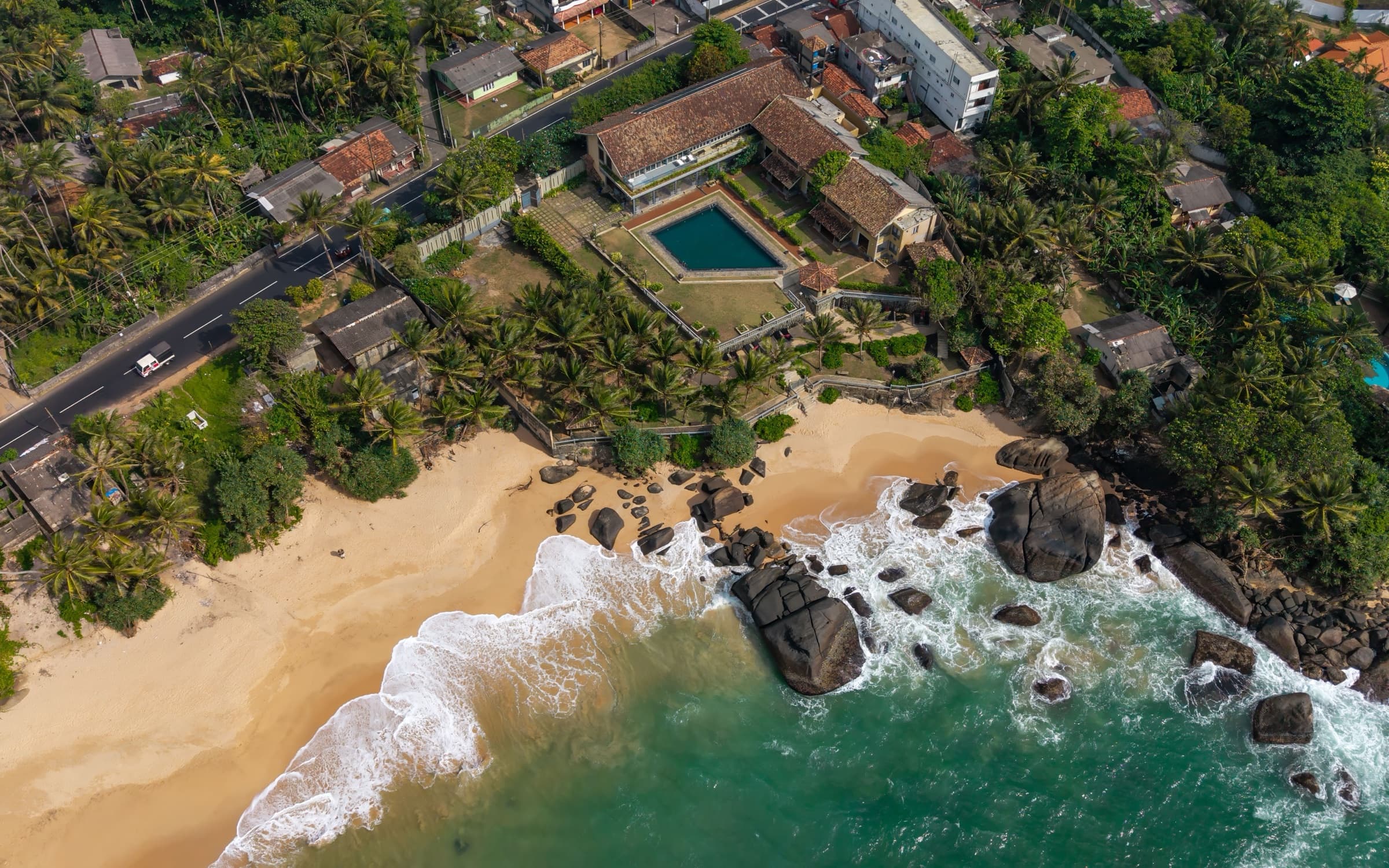 Aerial view of the coastline and property