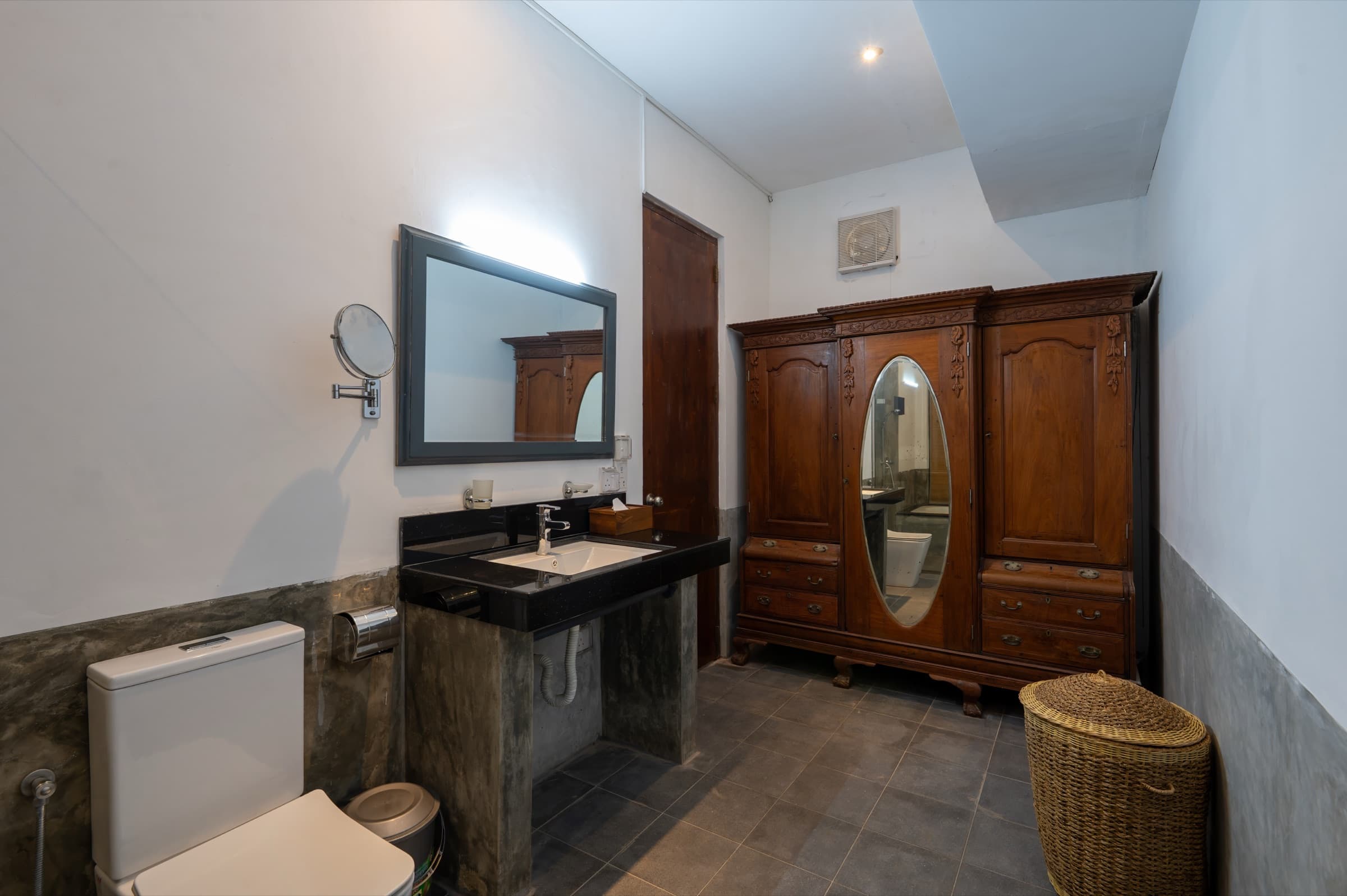 Guest bathroom with vanity and wardrobe