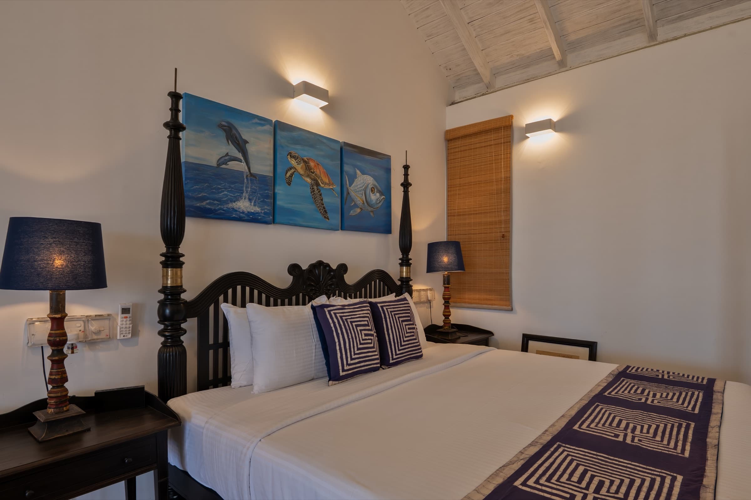 Guest room with coastal art