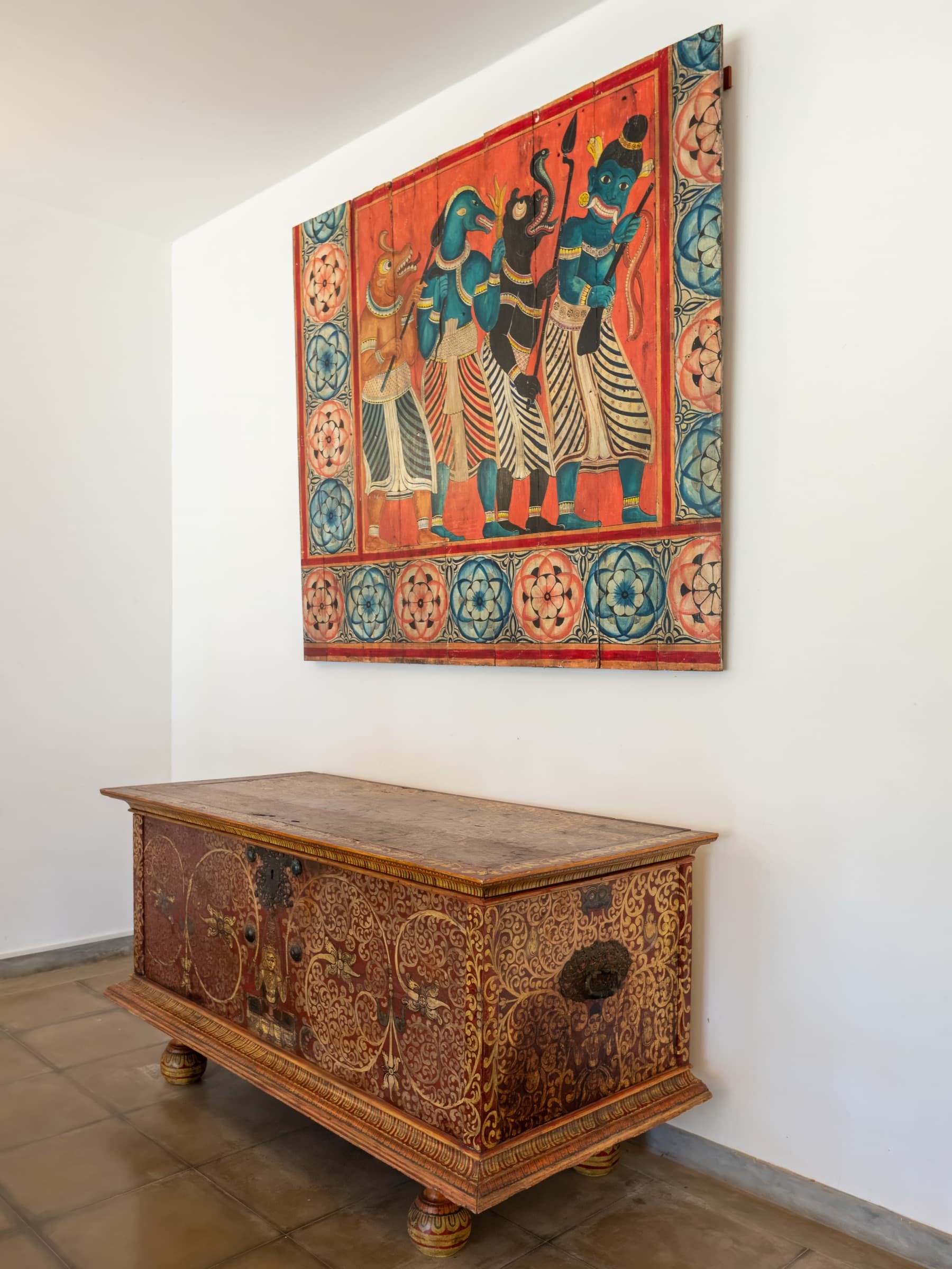 Antique cabinet and wall tapestry